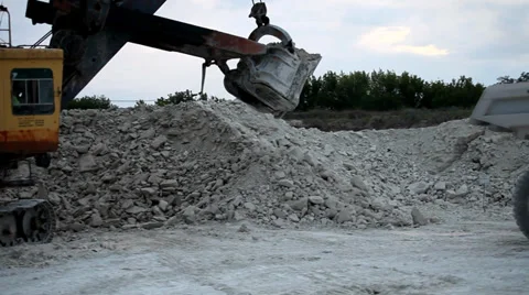 Heavy mining dump truck being loaded with iron ore Stock Footage 33827894