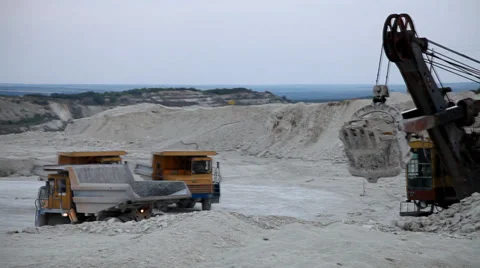 Heavy mining dump truck being loaded with iron ore Stock Footage 33828205