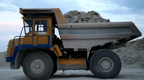 Heavy mining dump truck being loaded with iron ore Stock Footage 38500117