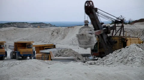 Heavy mining dump truck being loaded with iron ore Stock Footage 38543727