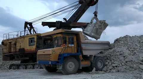 Heavy mining dump truck being loaded with iron ore Stock Footage 44121090
