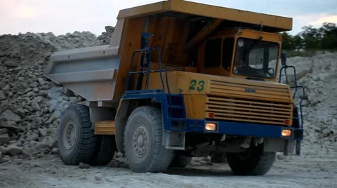 Heavy mining dump truck being loaded with iron ore Video stock 44121495