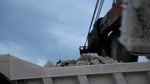 Heavy mining dump truck being loaded with iron ore Video stock 44121558