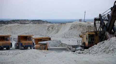 Heavy mining dump truck being loaded with iron ore Video stock 44121999