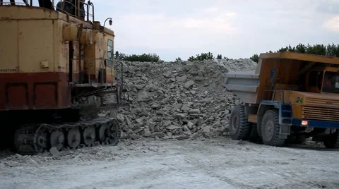 Heavy mining dump truck being loaded with iron ore Video stock 44122167