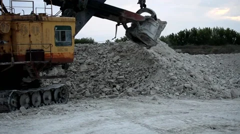 Heavy mining dump truck being loaded with iron ore Video stock 44122362