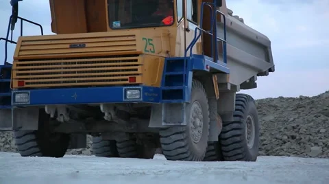 Heavy mining dump truck being loaded with iron ore Stock Footage 63993543