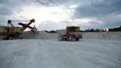 Heavy mining dump truck being loaded with iron ore Stock Footage 128754688