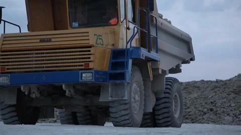 Heavy mining dump truck being loaded with iron ore Stock Footage 128754711