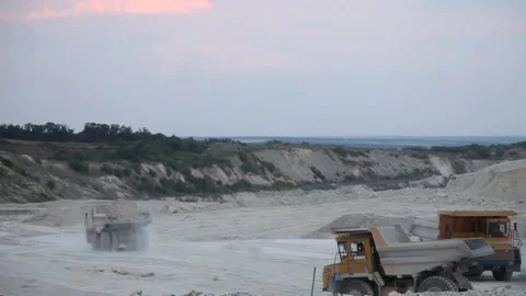 Heavy mining dump truck being loaded with iron ore Stock Footage 128754856