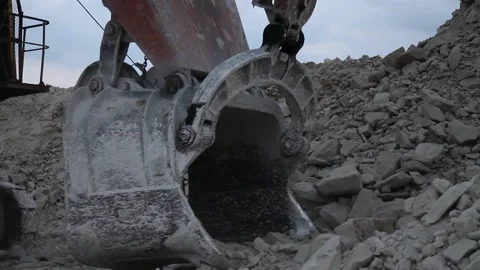 Heavy mining dump truck being loaded with iron ore Stock Footage 128754940