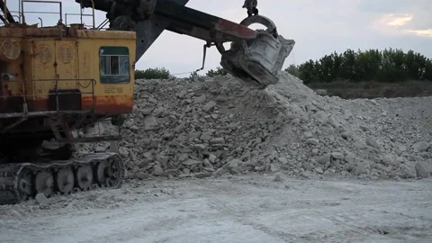 Heavy mining dump truck being loaded with iron ore Stock Footage 128755134