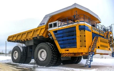 Heavy mining dump trucks are at the factory. Stock Photos