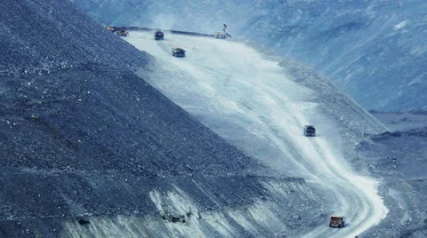 Heavy mining dump trucks moving along the opencast Stock Footage 29168364