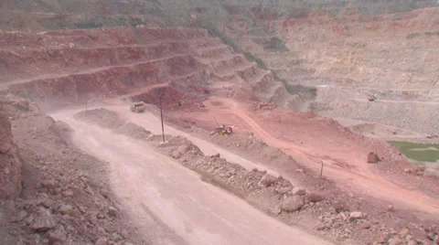 Heavy mining machinery is working in an open pit mine Stock Footage 29654409