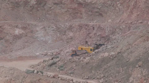 Heavy mining machinery is working in an open pit mine Stock Footage 29654457