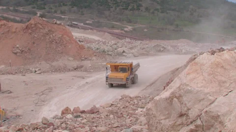 Heavy mining machinery is working in an open pit mine Stock Footage 29658462