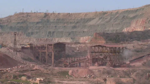 Heavy mining machinery is working in an open pit mine Stock Footage 29658522
