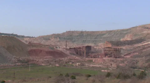 Heavy mining machinery is working in an open pit mine Stock Footage 29658597