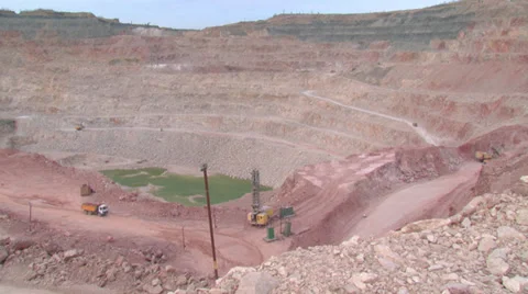 Heavy mining machinery is working in an open pit mine Stock Footage 29659253
