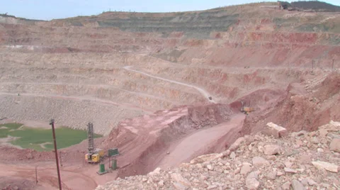 Heavy mining machinery is working in an open pit mine Stock Footage 29659289