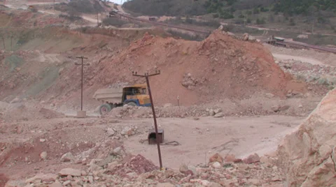 Heavy mining machinery is working in an open pit mine Stock Footage 29659438
