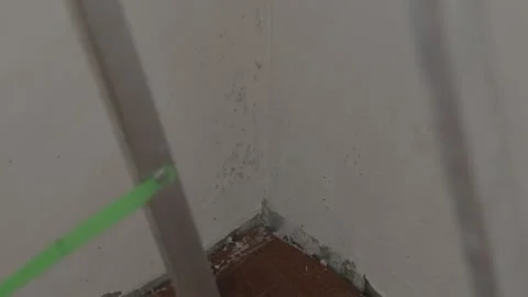 Heavy mold contamination on corner of house wall due to water leak 스톡 동영상 338003243