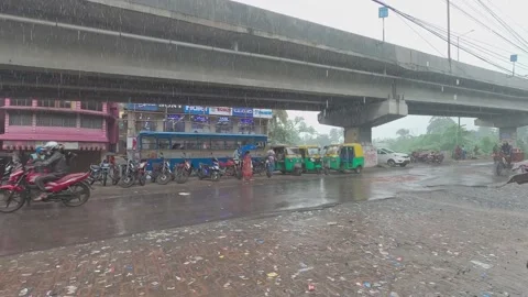 Heavy monsoon rain falling on city street. Kolkata West Bengal India South As Stock Footage 163488013