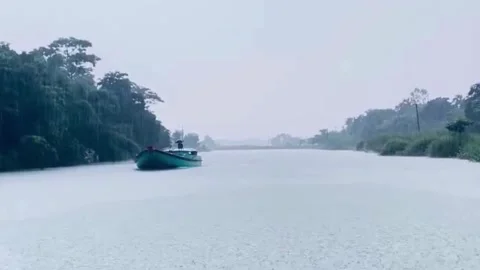 Heavy Monsoon Rain on River Stock Footage 337761836