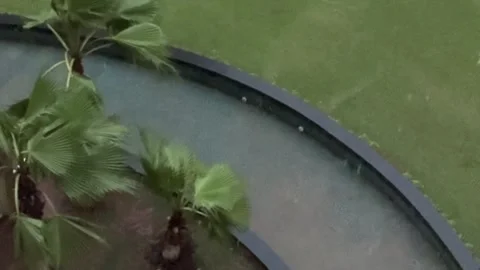 Heavy Monsoon Rainfall Viewed from Window During Daytime Stock Footage 337983344