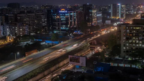 Heavy Night Traffic Time lapse on Mumbai Pune Highway, Pune City, Maharashtra Stock Footage 138042014