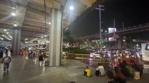 Heavy Night Traffic under Rain in Mandaluyong 4K 60fps Video stock 338350462