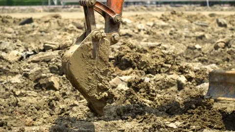 Heavy orange machine crawler loader or loader excavator, removing soil from g 스톡 동영상 89294360