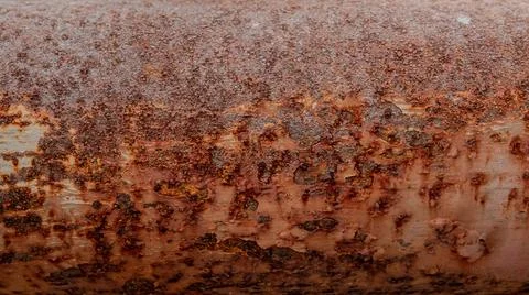 Heavy orange rust texture on iron pipe Stock Photos