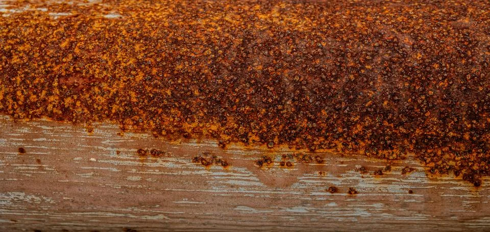 Heavy orange rust texture on iron pipe Фото