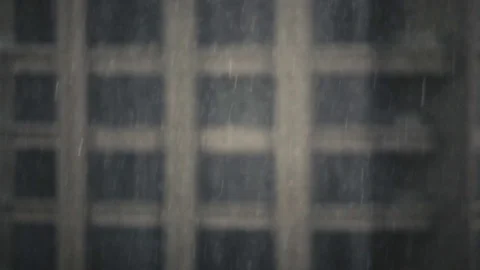 Heavy rain against a backdrop of a skyscraper in a large city Stock Footage 71369937