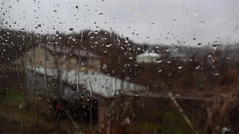 Heavy Rain and rain drops of glass. Video stock 76929509