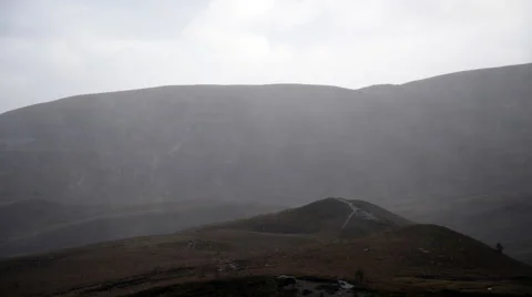 Heavy rain and wind over cairngorm scottish highland hills 動画素材 68055937
