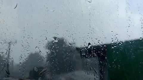 Heavy rain background with water droplets on window glass Stock-Footage 325612792