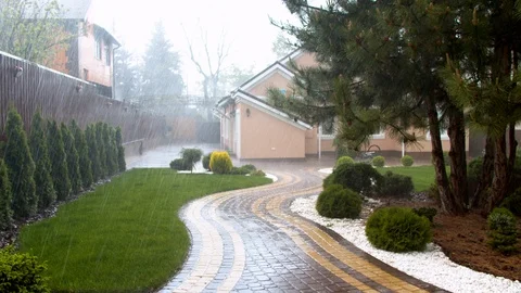 Heavy rain in the backyard Stock Footage 130061930