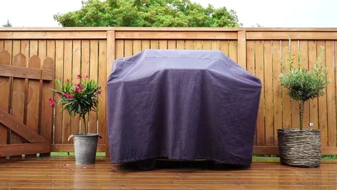 Heavy rain on a bbq grill Stock Footage 81001588
