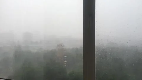 Heavy rain behind the window. Stock Footage 327972951