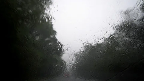 Heavy Rain Behind Windscreen with Moving Wipers. Danger on Road. Near-Zero Video stock 89542393