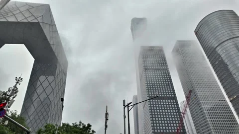Heavy Rain in Beijing CBD Street, Skyscrapers and Traffic, China - May 2026 Stock Footage 336599652