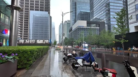 Heavy Rain in Beijing CBD Street, Skyscrapers and Traffic, China - May 2026 Stock Footage 336601558