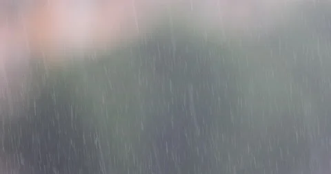 Heavy rain on a blurred background during a thunderstorm Stock Footage 156966304