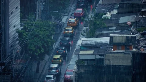 Heavy Rain On City Road In Developing Country Stock Footage 77939537