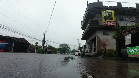 Heavy rain covers a rain-slicked road. Ideal POV for weather, travel Vídeos de archivo 334626679