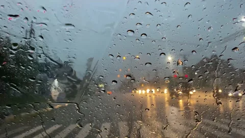 Heavy Rain on Crossroad Stock Footage 143695449