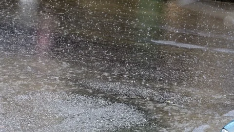 Heavy rain drops falling on the road during storm Stock Footage 100198168